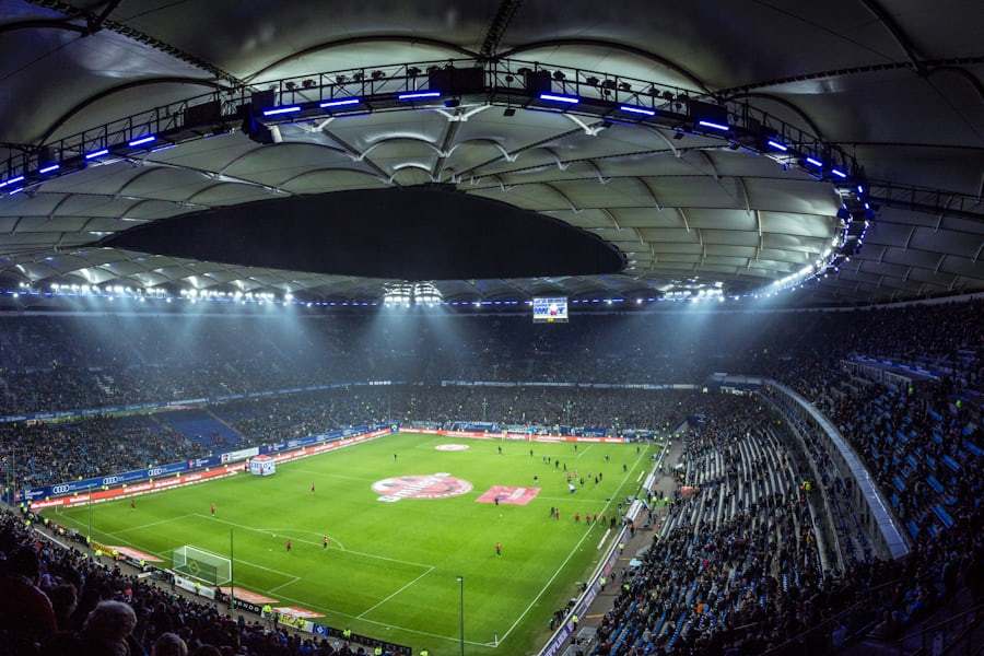 Bola sepak di stadion saat pertandingan berlangsung
